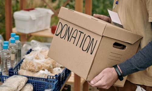 male-volunteer-holding-packed-donation-box-2021-10-20-03-17-47-utc-Copy.jpg